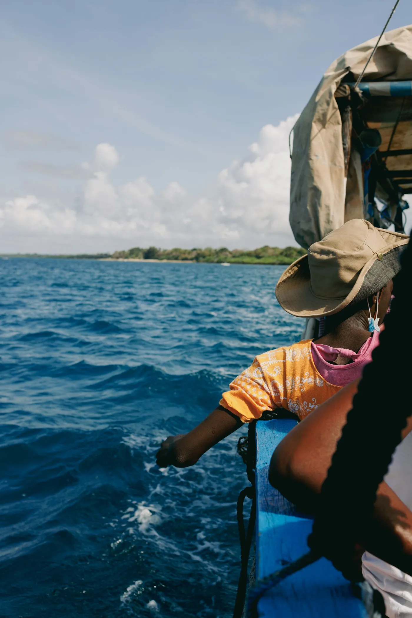 Traveler on a boat looking out at the sea