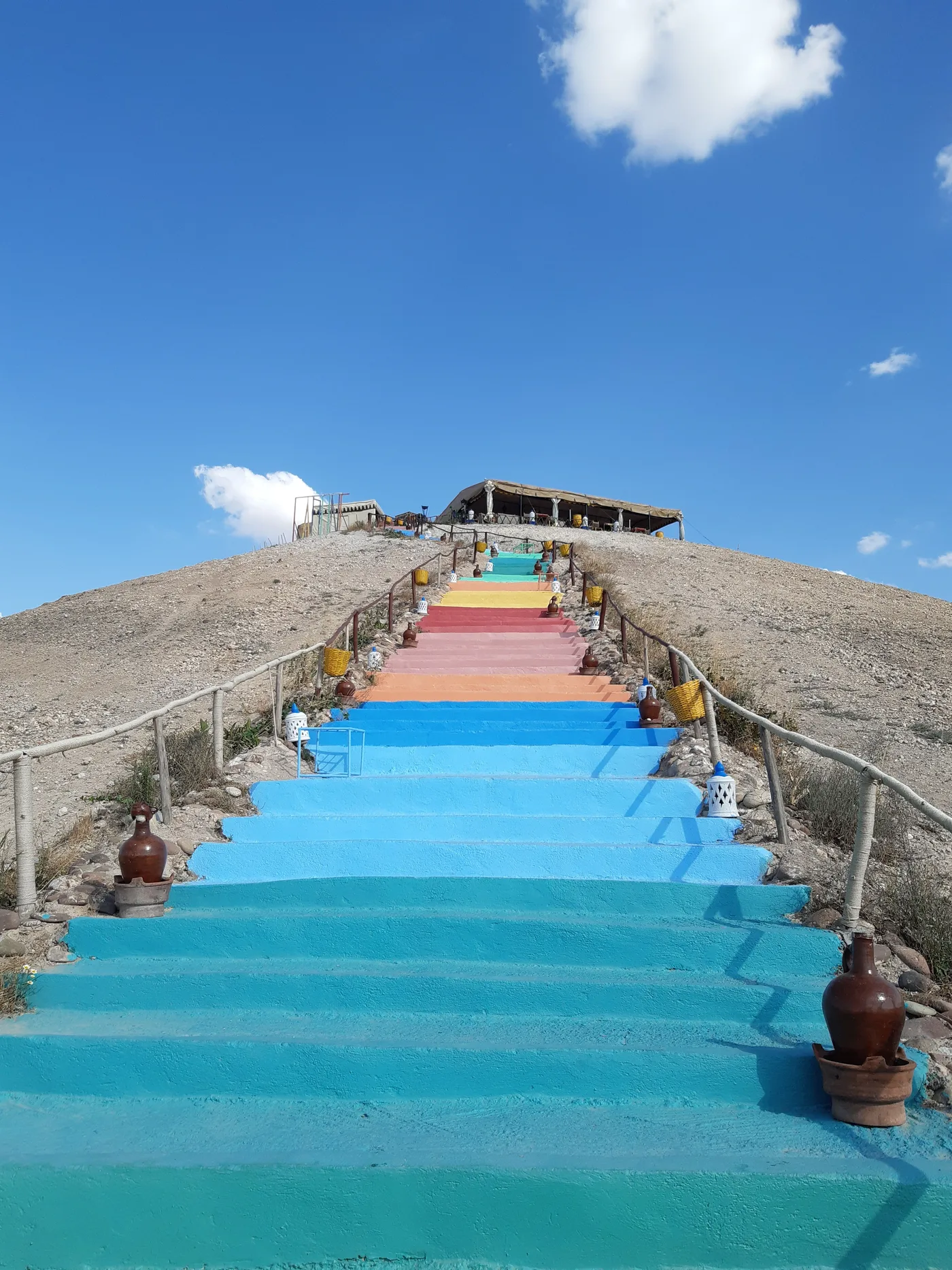 Colorful staircase in a Moroccan desert landscape